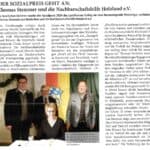 Zeitungsauschnitt mit Foto und Text