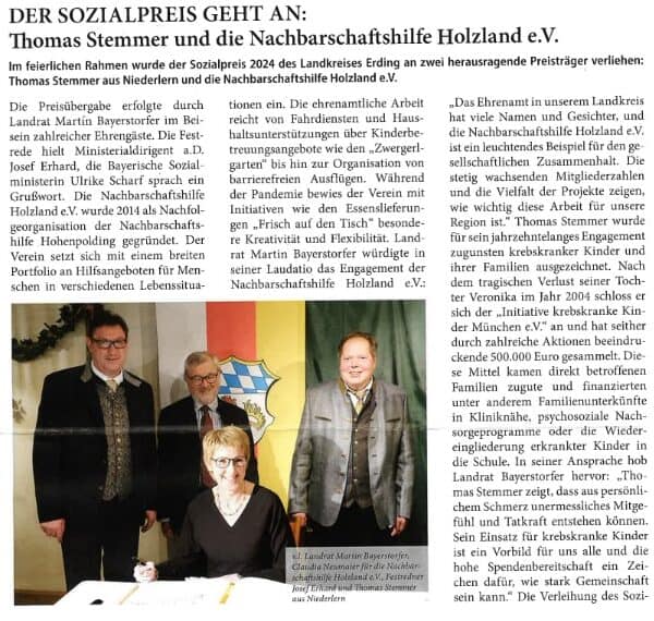 Zeitungsauschnitt mit Foto und Text